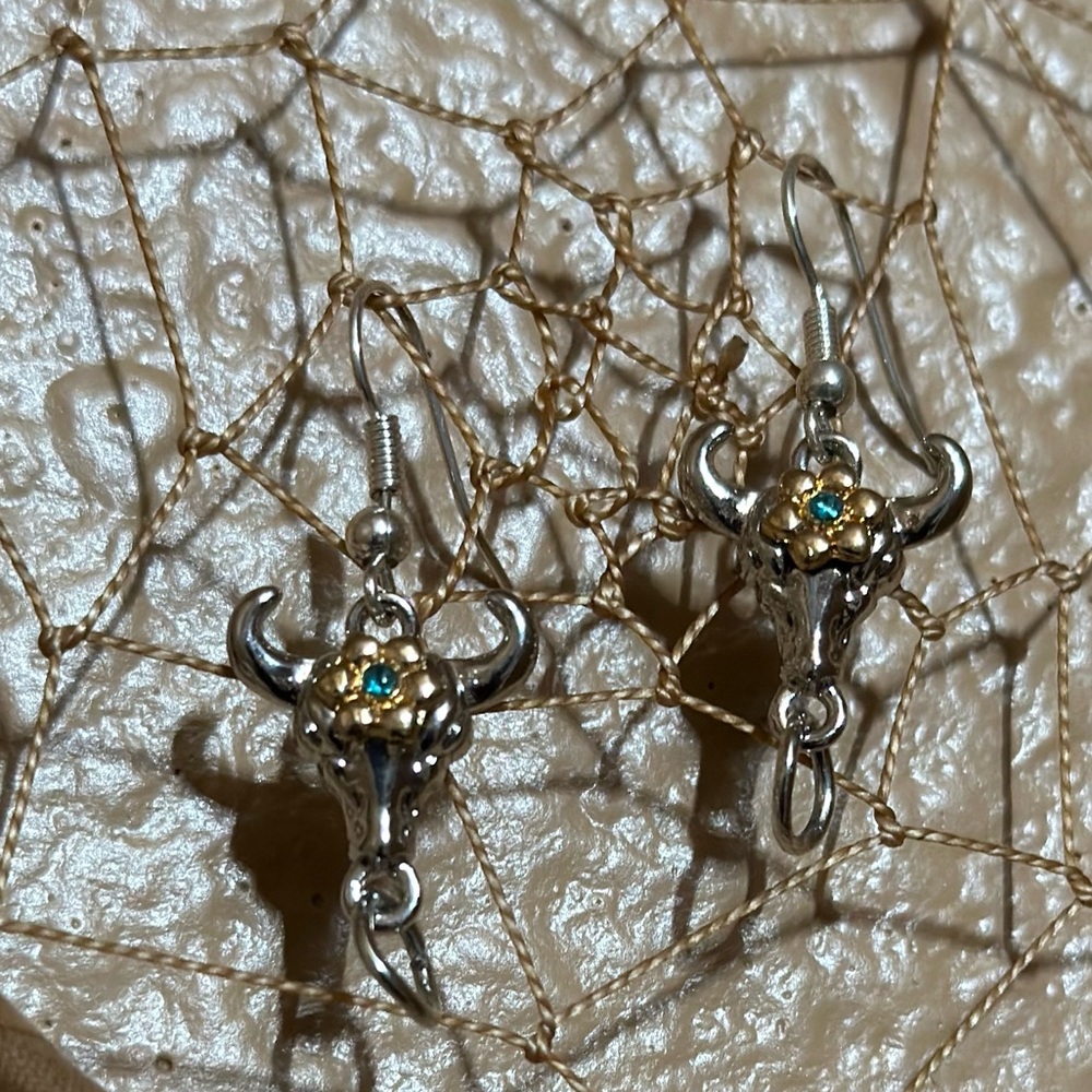 Bull faced earrings with colorful eyes